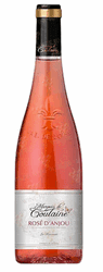 Rosé wine bottle with pink liquid and label
